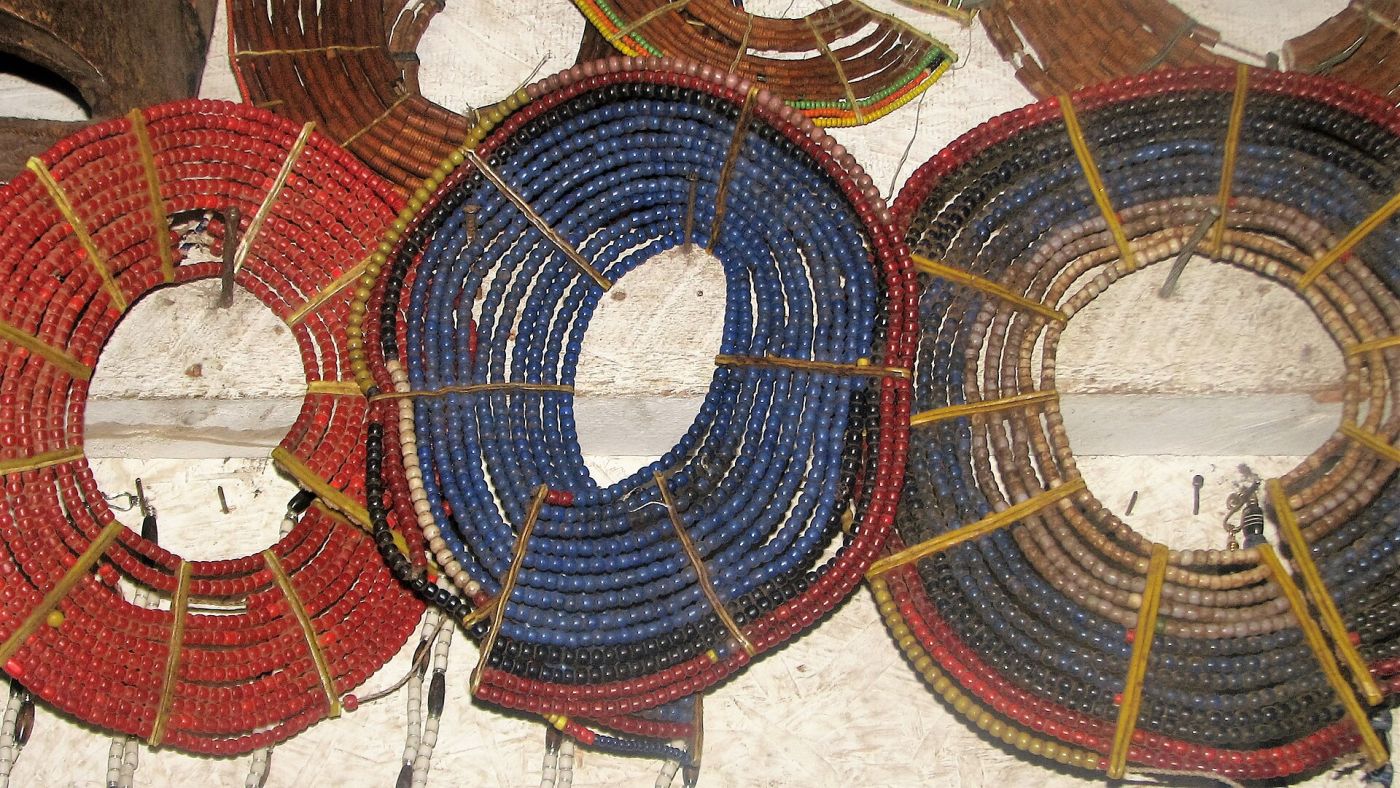 Turkana neck rings of beads strung on wire in red, blue and black